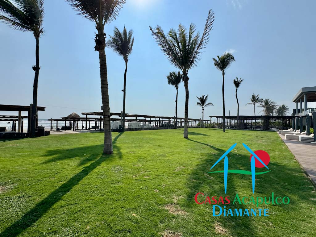 Bayam Residences - Jardines y playa 1